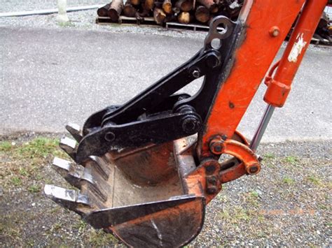 how to use thumb on mini excavator|manual thumb for mini excavator.